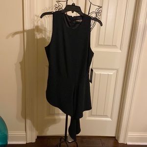 New with tag. Gabrielle Union asymmetrical top w white under side.